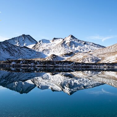 Reflection in the reservoir Masner in Serfaus-Fiss-Ladis | © Serfaus-Fiss-Ladis Marketing GmbH | Andreas Kirschner