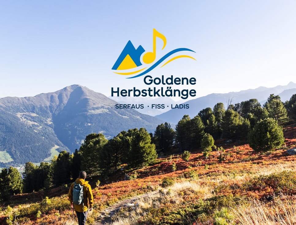 Eine Wanderung in den Alpen mit dem Logo Goldene Herbstklänge.