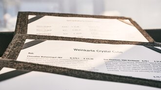 Detailansicht der Weinkarte mit Rotweinen und Preisen.