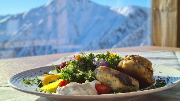 Cheese dumplings with salad